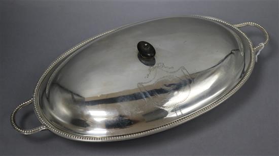 A George III silver oval two handled entree dish and cover, 27.5 oz.